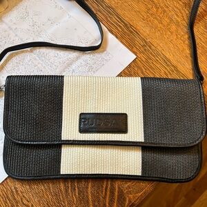 Rudsak straw clutch.